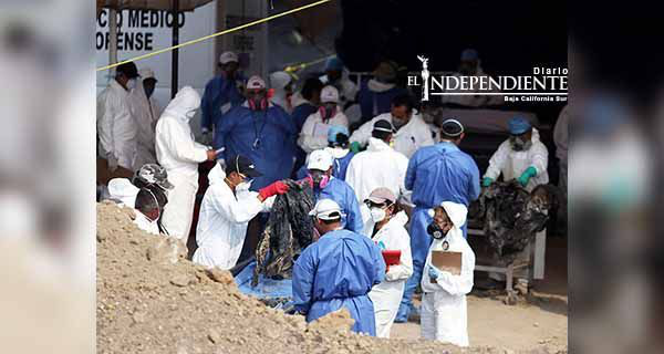 Hallan 2 niños y un feto entre 117 cuerpos exhumados en Tetelcingo