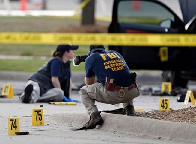 Van cuatro detenidos por muerte de dos policías en EU