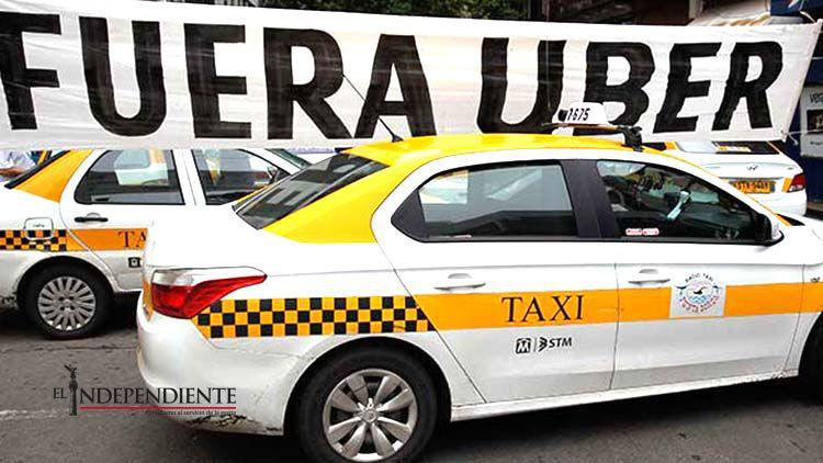 Confrontan taxistas uruguayos a Uber… registrando la marca