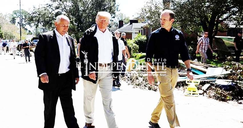 En medio del desastre, Trump pregunta por su club de golf En medio del desastre, Trump pregunta por su club de golf