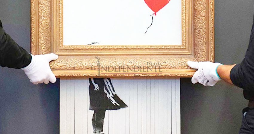 Desactivan trituradora escondida del cuadro de Banksy Desactivan trituradora escondida del cuadro de Banksy