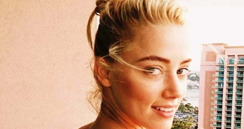Amber Heard reta a Instagram y publica foto que muestra un pecho desnudo Amber Heard reta a Instagram y publica foto que muestra un pecho desnudo