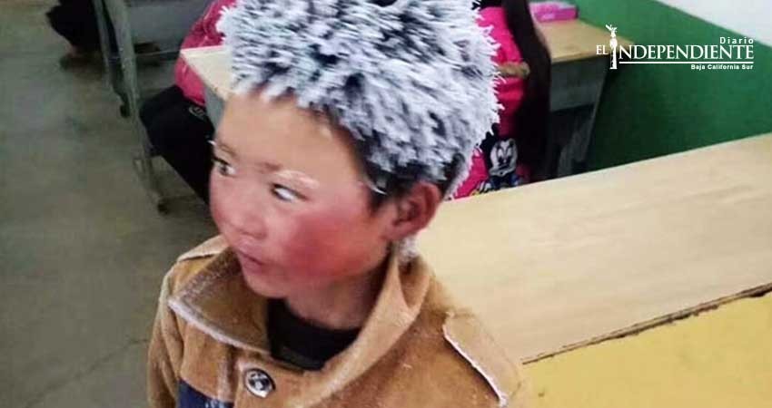 Sorprende imagen de niño con pelo congelado en China