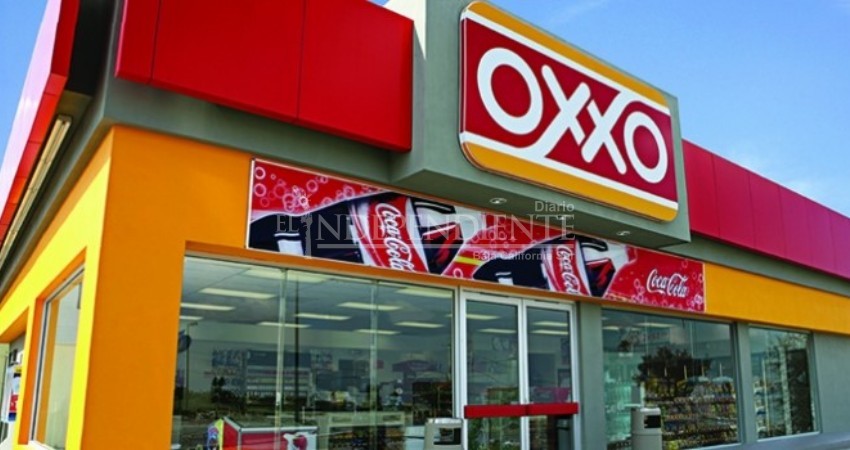 Le puso la pistola en la cabeza a cajera de Oxxo para asaltarla