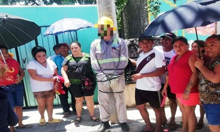 Amarran a un poste a trabajador de la CFE por apagones en Yucatán