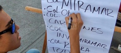 Voluntarios en Loreto regalan cubrebocas y exigen agua potable