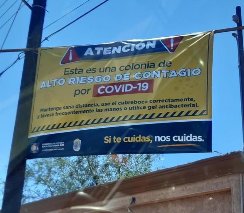 Colocan mantas de advertencia en colonias de BCS con altos niveles de contagio 