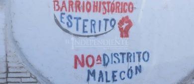 De nuevo se manifiesta El Esterito: Pintan bardas contra Distrito Malecón y derrames de agua